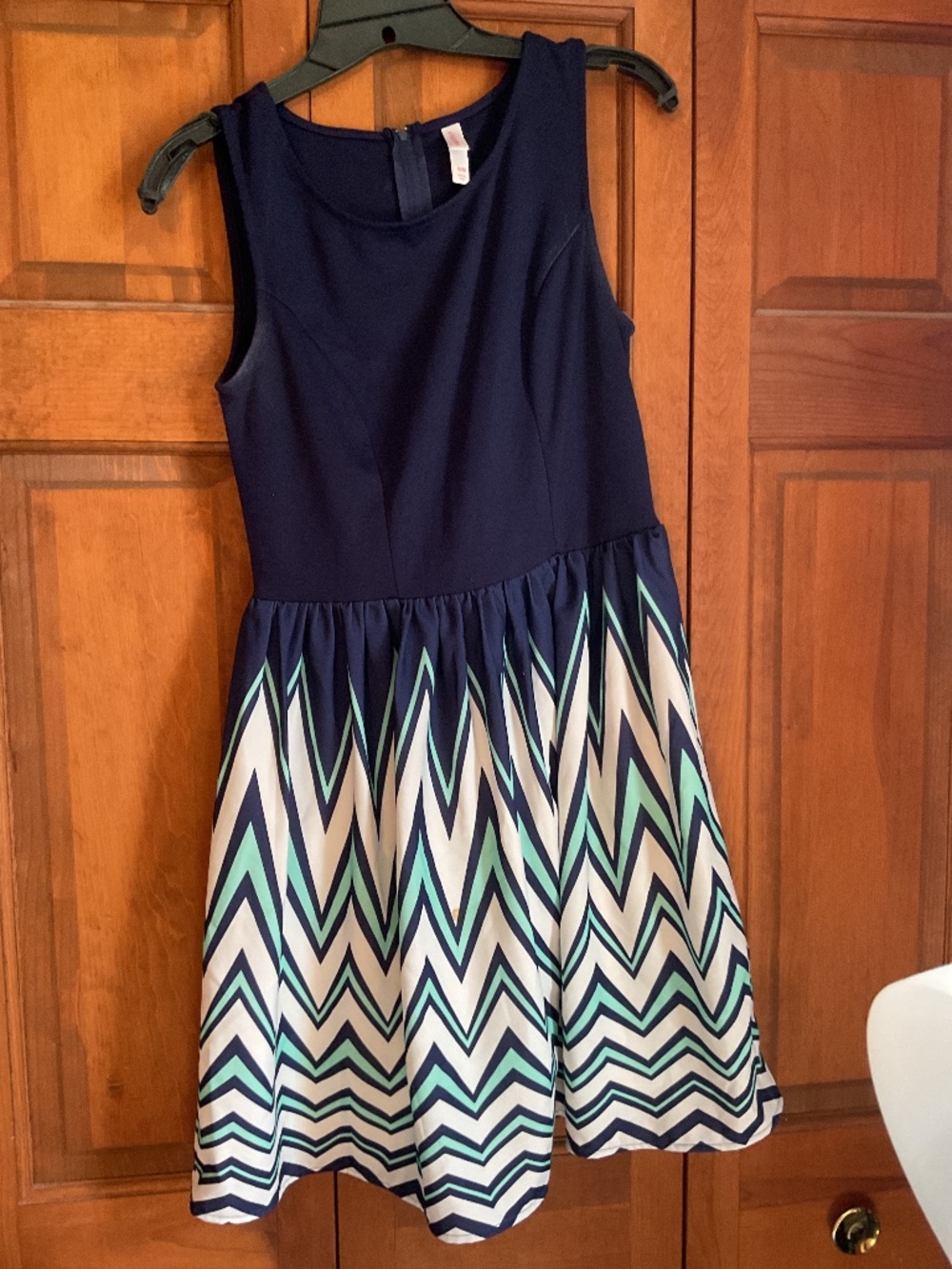 Xhilaration brand size medium.  Blue dress with variations on the bottom
